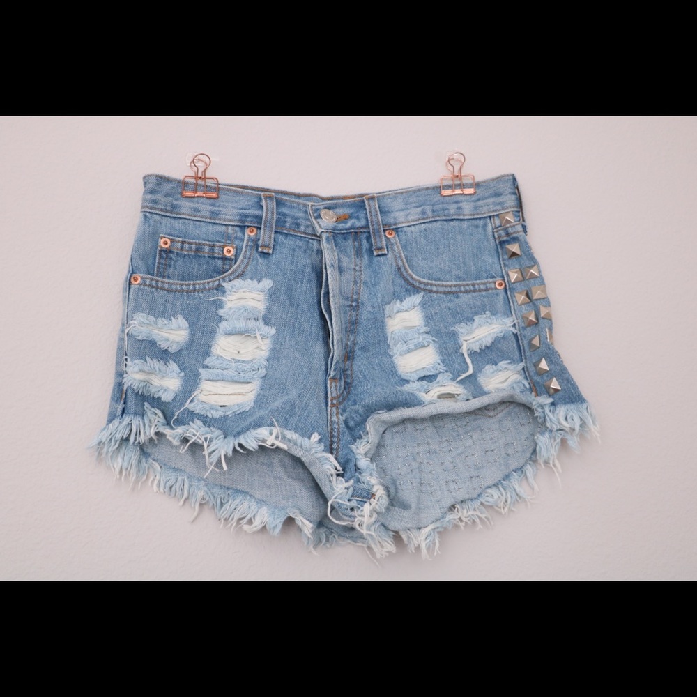 Studded denim shorts with highrise and frayed hem